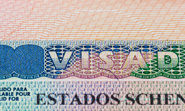 istock Europe schengen visa in passport 1208250044