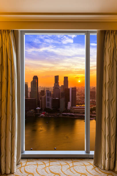 istock Hotel room and Singapore view 1208250238