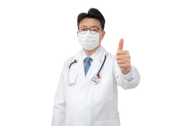 istock Middle-aged Asian man wearing a disposable mask 1208254683