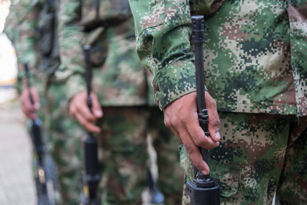 Colombian Army soldiers in formation. Colombian army soldiers with assault rifle in hand in a military formation. Colombia. army stock pictures, royalty-free photos & images