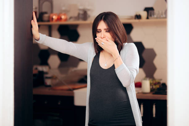 istock Pregnant Woman Feeling Sick in Her Kitchen 1208260778
