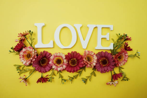 istock Valentine's Day Background with Love alphabet letter on yellow background 1208263338