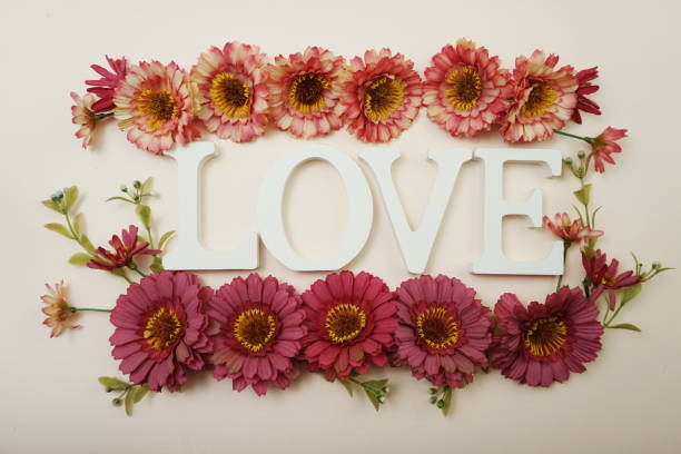 istock Valentine's Day Background with Love alphabet letter on pink background 1208263406