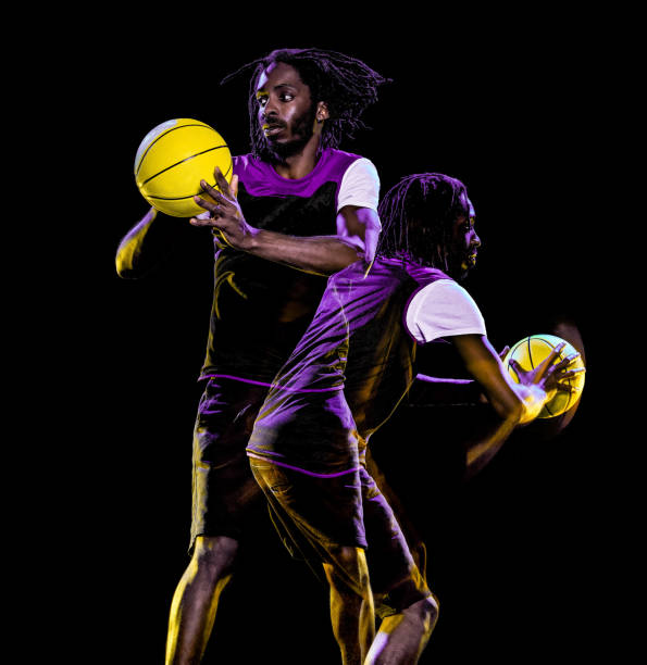 istock african basketball player man isolated black background 1208270652