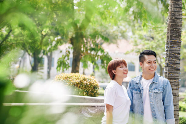 istock Happy couple in city park 1208272030