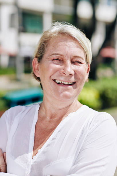istock Laughing senior woman 1208272171
