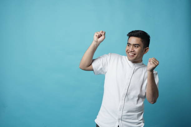 istock Dance Move Southeast Asian Young Man - Copy Space 1208273388