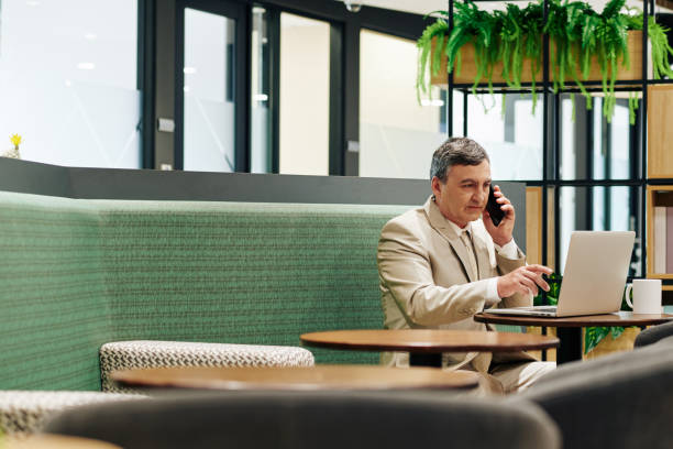 istock Entrepreneur talking on phone 1208274145