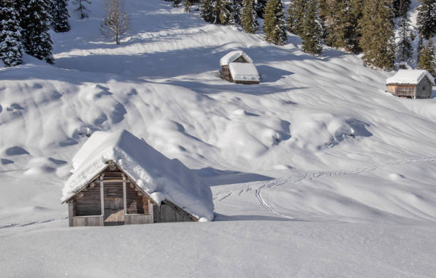 istock Mountain hut covered in snow, mountains 1208290342