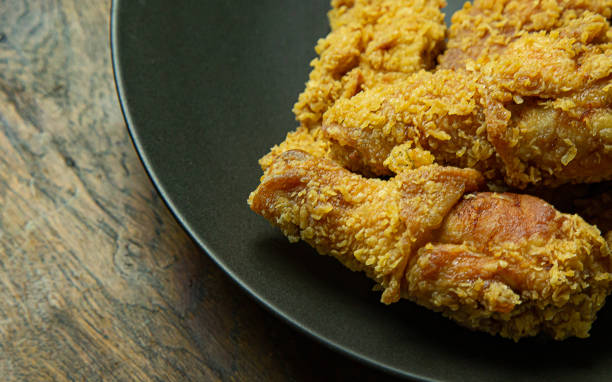 istock American fried chicken close up image for food content. 1208296687
