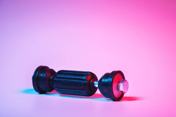 istock Car front suspension anti-roll bar mount. New tie rod in double red-blue light 1208299977