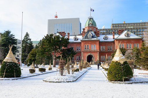 Sapporo, Japan - December 21, 2019 : Beautiful architecture former government building hall landmark of Sapporo city Hokkaido Japan in snow winter season.