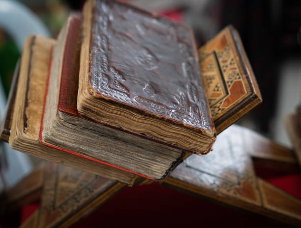 istock Old books in a flea market for sale, selective focus. 1208302266