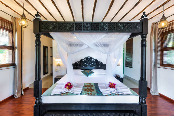 istock Double Bed In African Style Appartment 1208302976