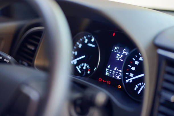 Modern car dashboard Modern car dashboard with error signs close up  side view dashboard close up speedometer odometer stock pictures, royalty-free photos & images