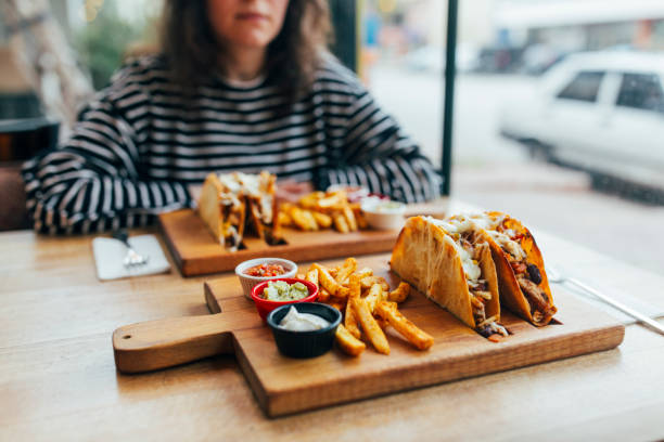 Woman Eating Taco