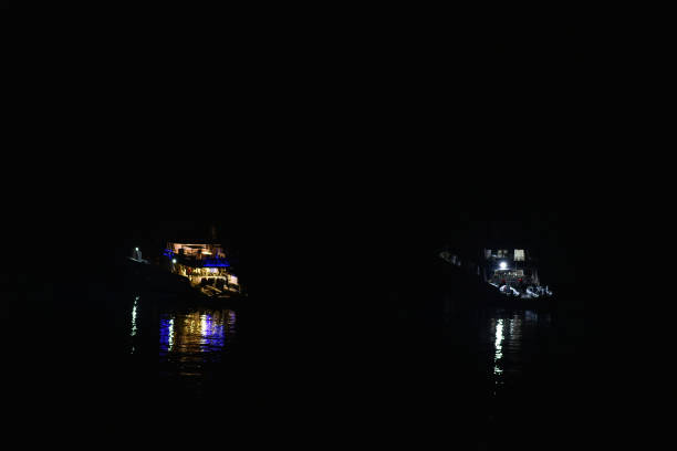 istock Divers yachts at night at sea 1208305611