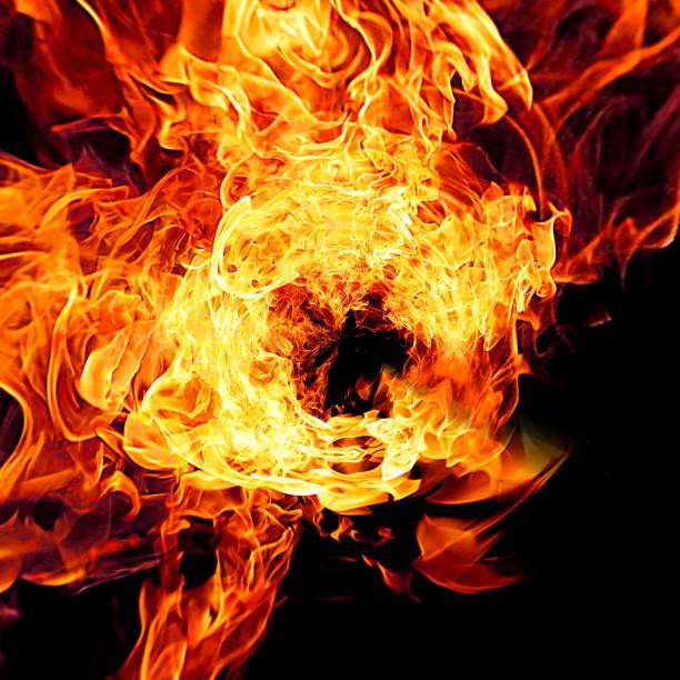 istock Abstract flames illuminating the dark 1208306207