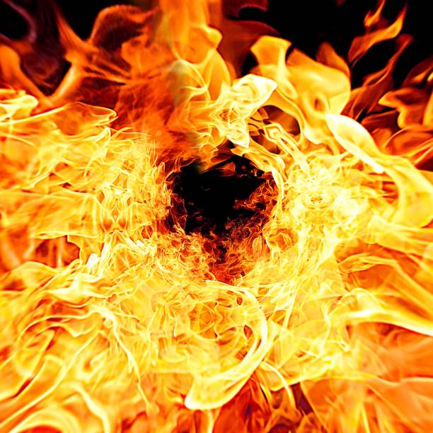 istock Abstract flames illuminating the dark 1208306212