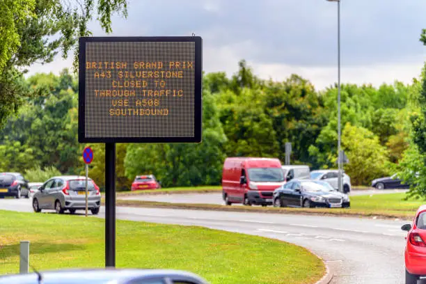 digital road traffic information display message british grand prix silverstone on road in england uk.