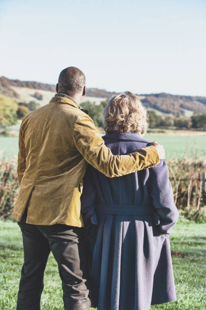 istock Mature couple looking at landscape 1208308841