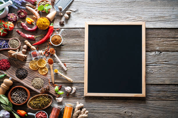 istock Spices herbs condiments seasoning on rustic wooden table 1208309230