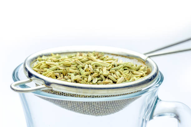 istock fennel seeds loose inside sieve ready to be brewed for healthy drink on white background 1208309301