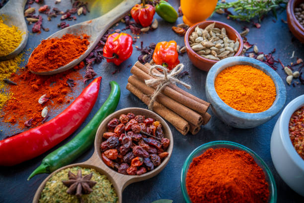 istock Spices herbs condiments seasoning on grunge gray background 1208309633
