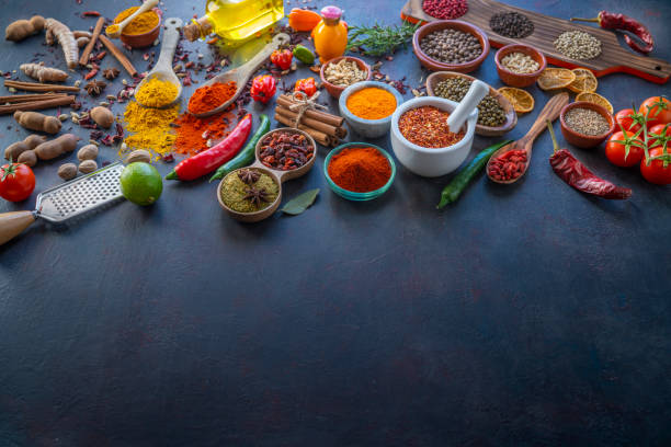 istock Spices herbs condiments seasoning on grunge gray background 1208309935