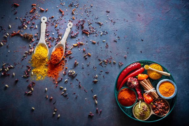 istock Spices herbs condiments seasoning on grunge gray background 1208310576