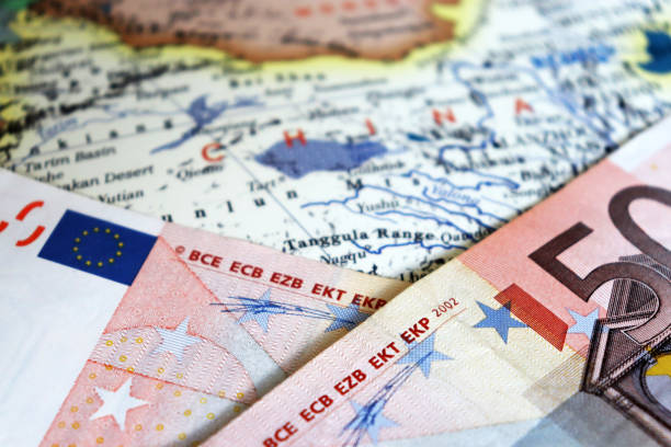 istock Euro banknotes on the map of China 1208310646