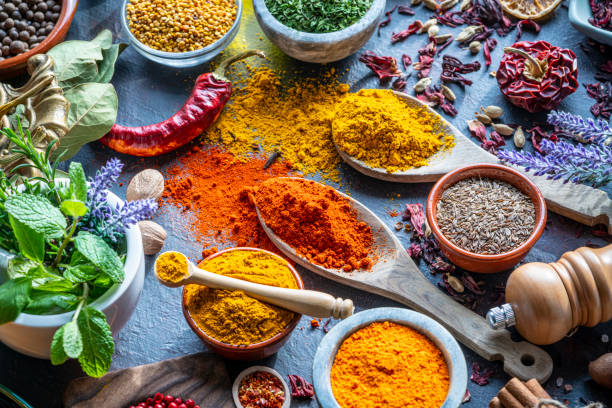 istock Spices herbs condiments seasoning on grunge gray background 1208310668
