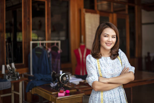 istock asian dressmaker in workroom 1208310783