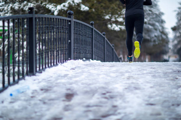istock Young athletic man exercising in the winter 1208310895