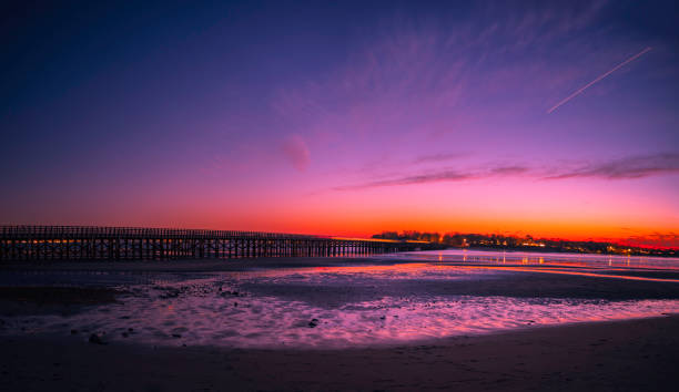 istock Powder Point Bridge over the Black River at Low Tide Nightscape 1208314467