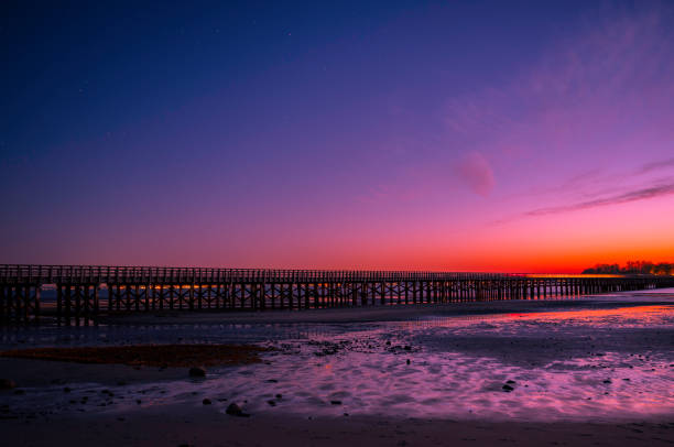 istock Powder Point Bridge over the Black River at Low Tide Nightscape 1208314546