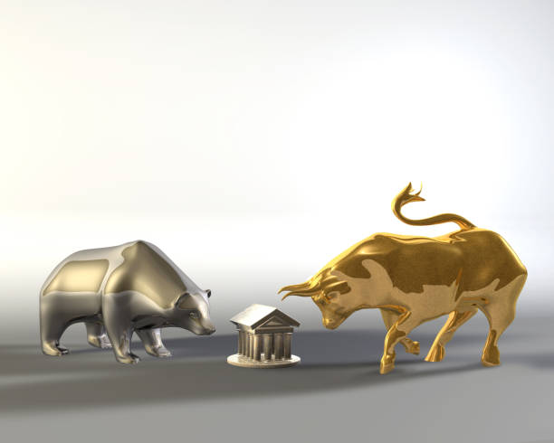 istock Golden bull and metal bear 1208314662