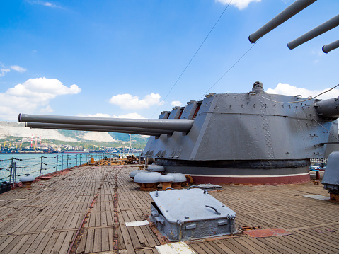 Novorossiysk, Russia - August 01, 2019: Gun turrets on the deck of the cruiser \