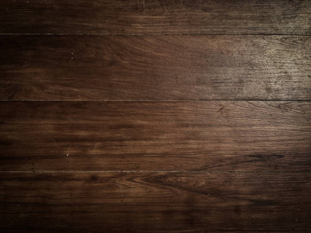 istock Brown soft wood surface as background for design. Vintage painted wooden texture, top view 1208320146