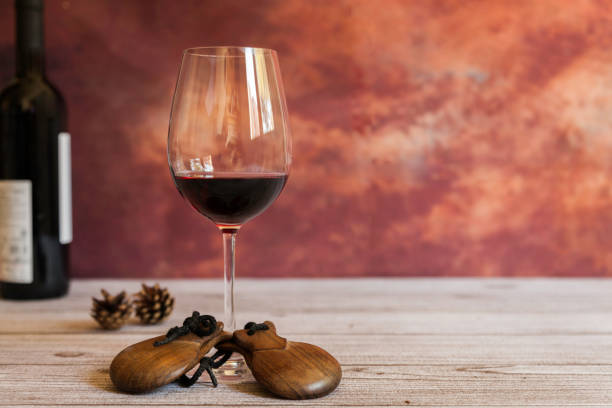 istock glass of red wine and Spanish castanets 1208320345