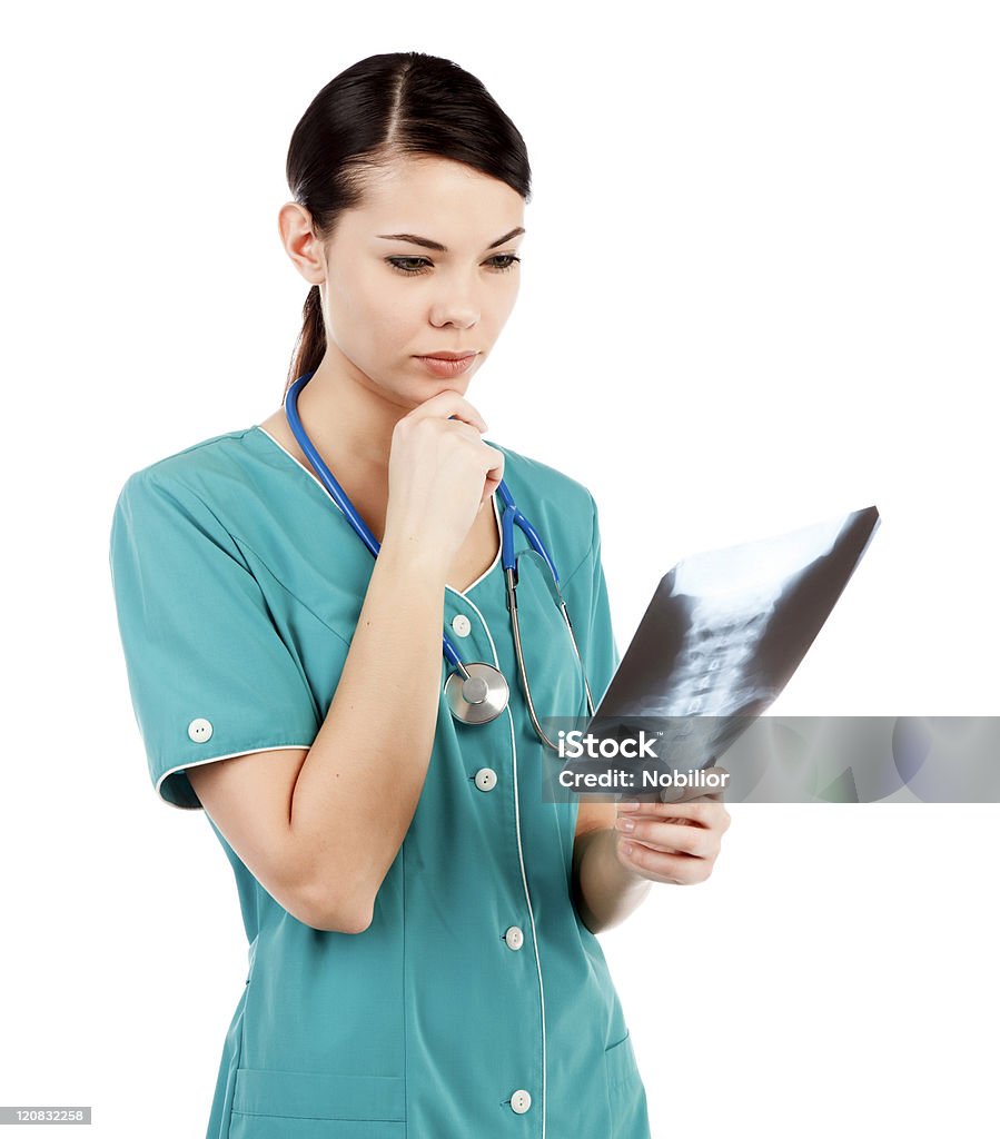 Doctor mirando a la imagen de rayos x - Foto de stock de Adulto libre de derechos