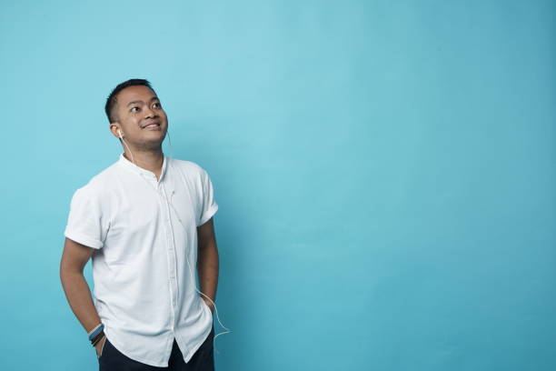 istock Southeast Asian Man with Earphone - Copy Space 1208326336