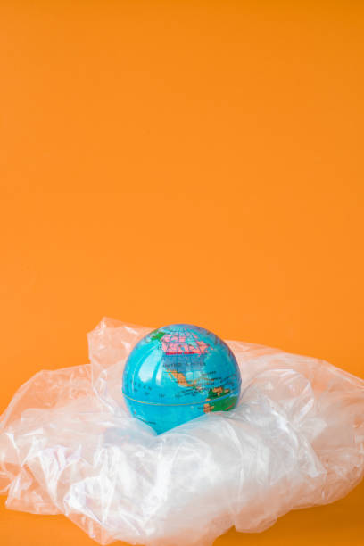 istock World Metaphor On Plastic Bag, Sustainability Concept 1208328023