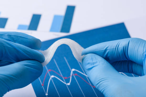 istock Scientist show layer of novel flexible foam like material 1208329430
