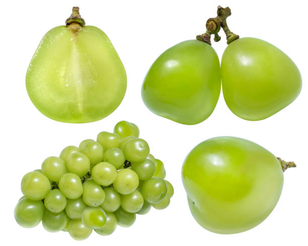 istock Green grape with leaves isolated on white. Shine Muscat Grape With clipping path. 1208330025