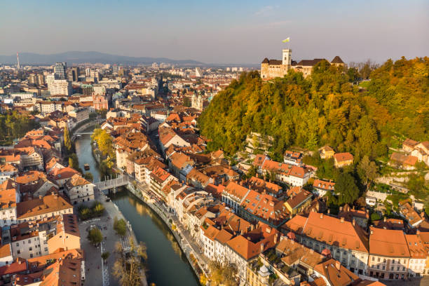 Cityscape of Ljubljana, capital of Slovenia in warm afternoon sun. Aerial panoramic view of Ljubljana, capital of Slovenia in warm afternoon sun. ljubljana castle stock pictures, royalty-free photos & images