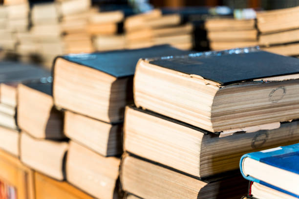 istock Old books background. No labels, blank spine. 1208331423