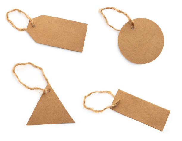 istock Various Price, discount or information tags on recycled paper with a hanging string. isolated on white. 1208335455