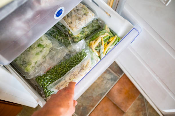 Freezer Drawer With Packed Vegetables stock photo
