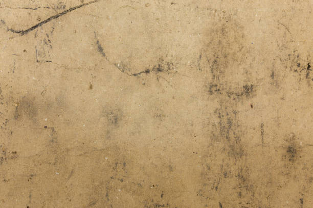 istock dirty flat cardboard surface texture and background with black spots of oil and technical pollutions 1208337178